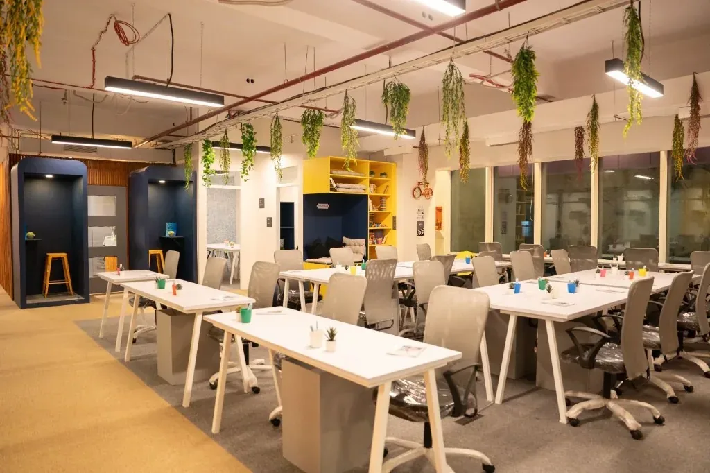 Teloz Spaces open coworking floor with hot desks and daylight